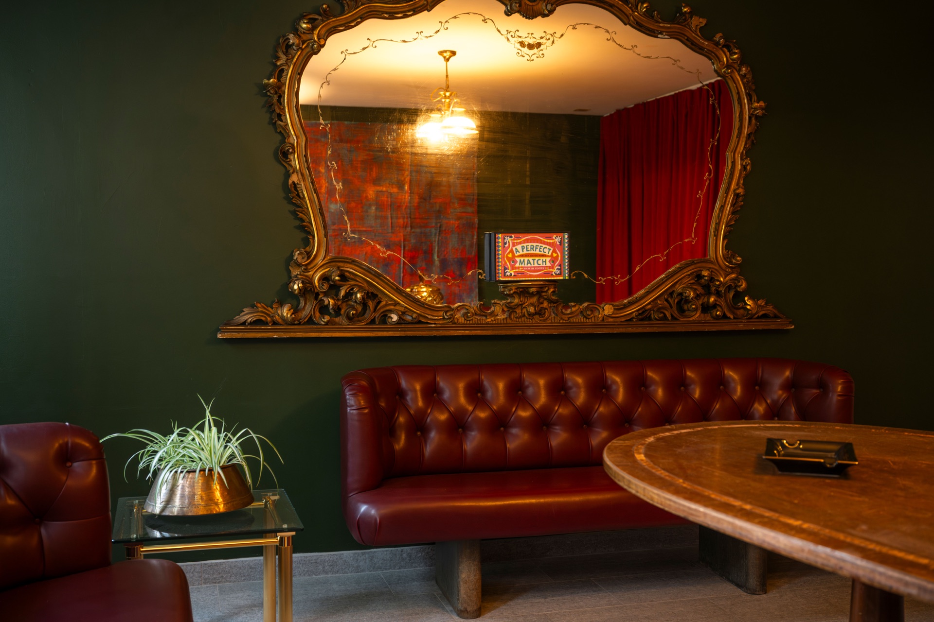 The etched mirror behind the bar