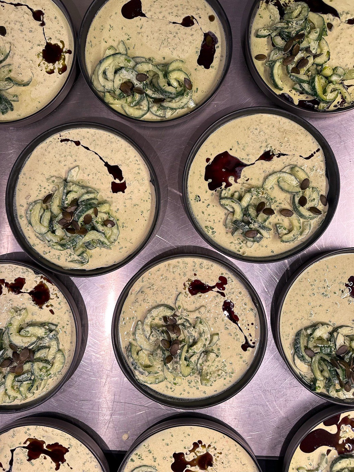 Chilled cucumber soup, plated for service at Villa Beaulieu