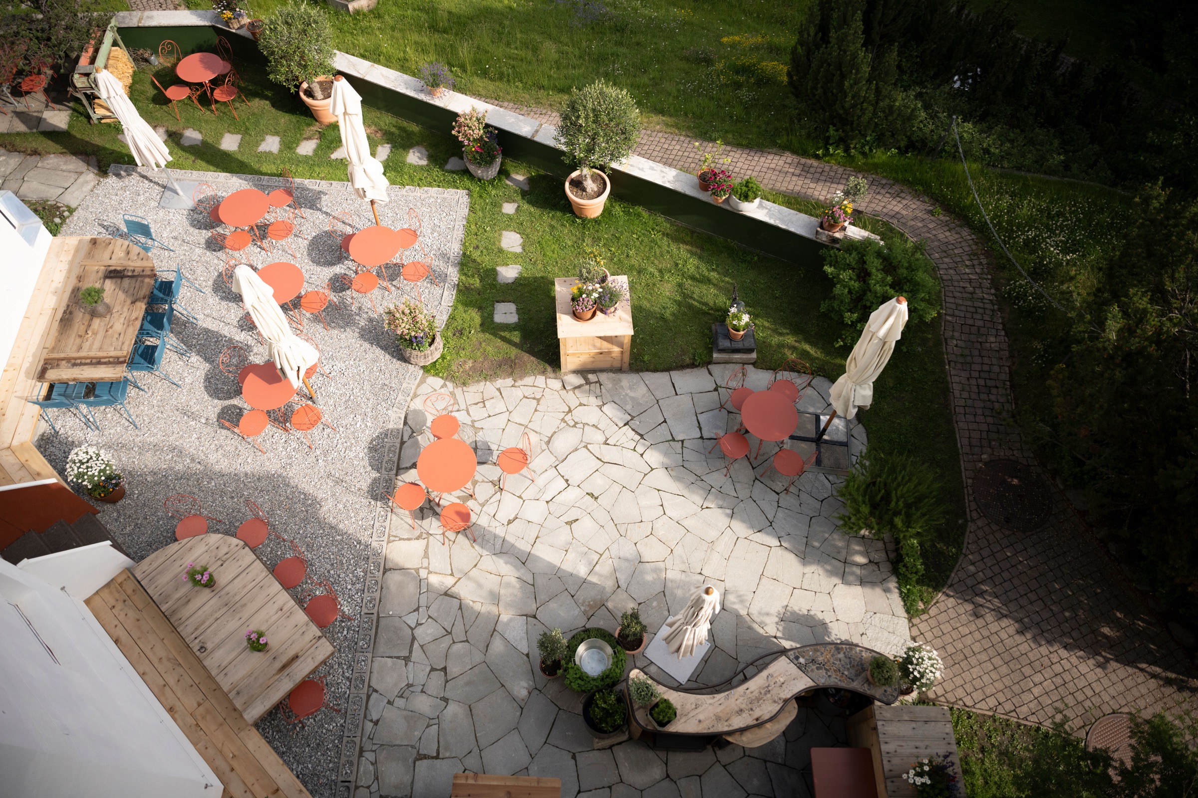 Aerial view of the Villa Beaulieu garden terrace with tables and umbrellas